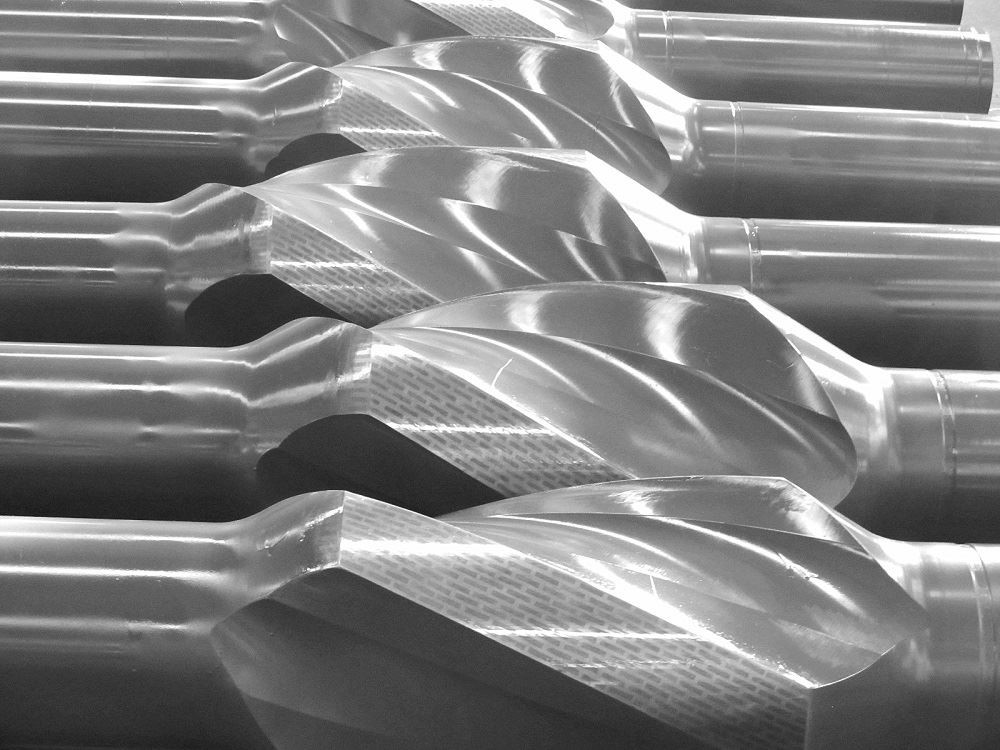 ダウンホール掘削ツール